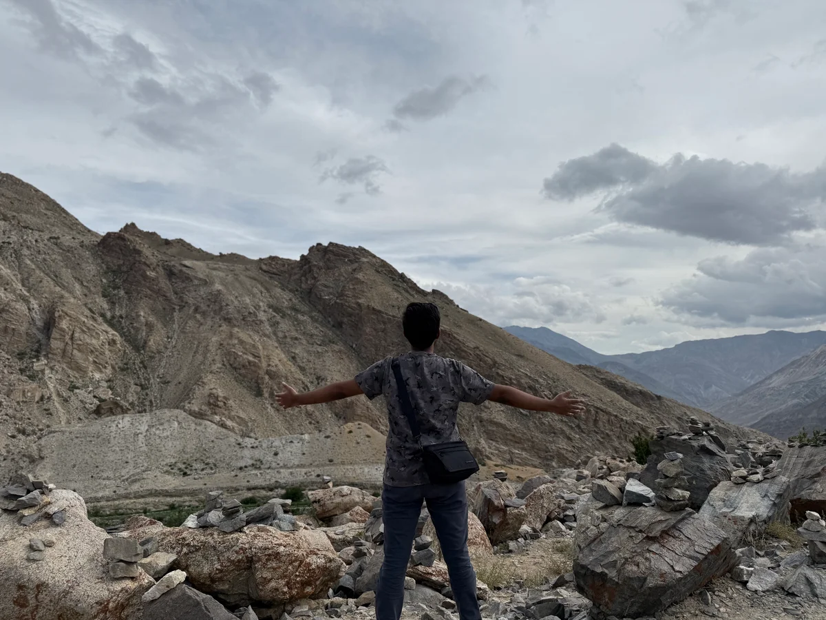 Me staring at the vastness of mountains